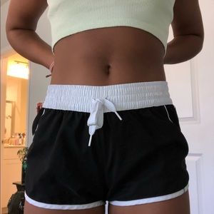 black broad shorts